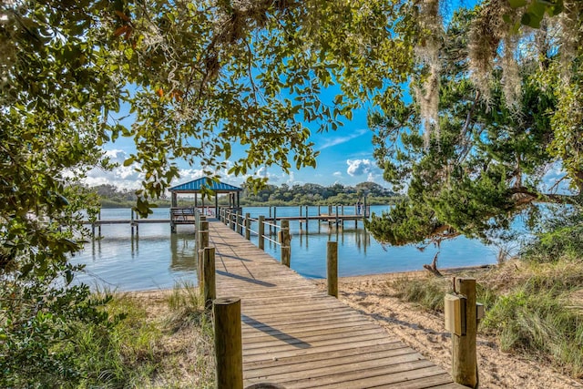 view of dock with a water view