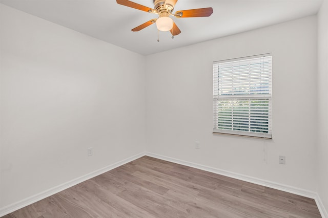 unfurnished room with ceiling fan and light hardwood / wood-style flooring