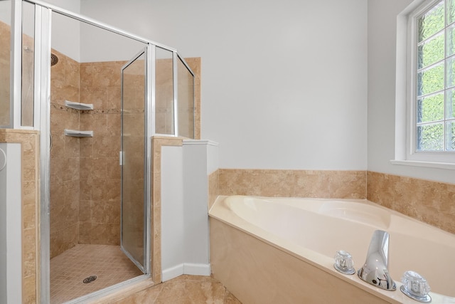 5827 Green Rd, Middleburg, FL 32068 - bathroom featuring plenty of natural light, a shower stall, and a garden tub