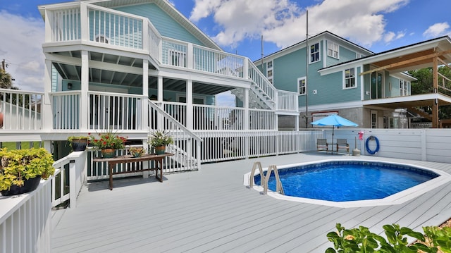 view of pool featuring a deck