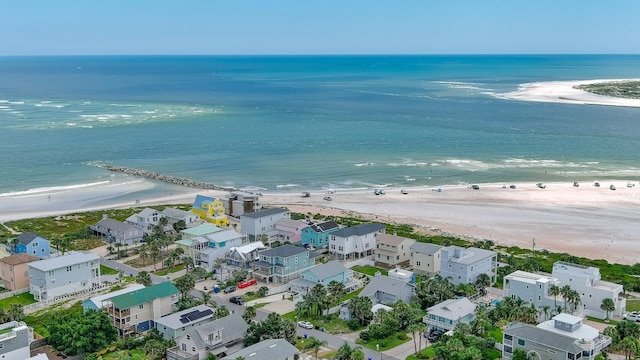 aerial view featuring a view of the beach and a water view