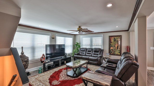 living room featuring crown molding, hardwood / wood-style floors, and ceiling fan