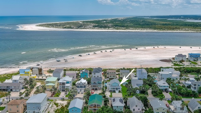 aerial view with a water view and a beach view