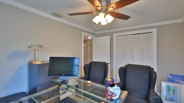 home office featuring ceiling fan and ornamental molding