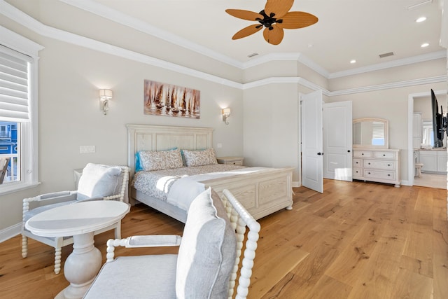 bedroom featuring crown molding, ceiling fan, ensuite bathroom, and light hardwood / wood-style floors