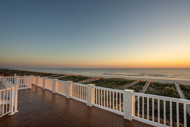 deck at dusk with a water view