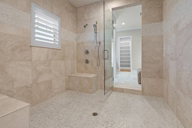 bathroom with tile patterned flooring and walk in shower