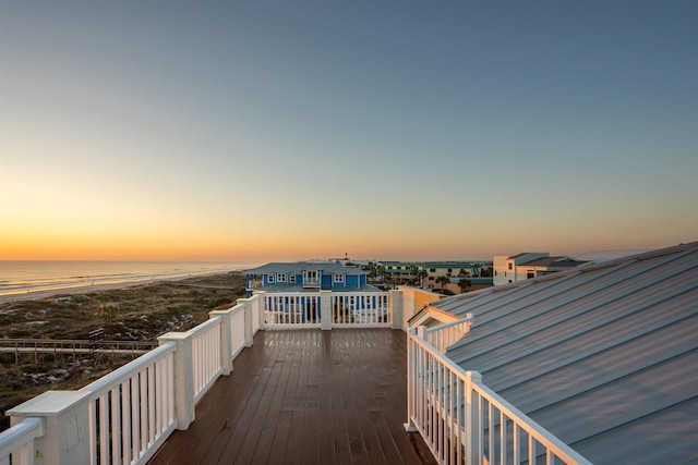 deck at dusk with a water view