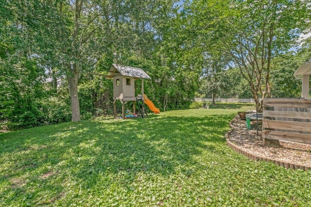 117 Mission Cove Cir, Saint Augustine, FL 32084 - view of yard featuring a playground and view of wooded area