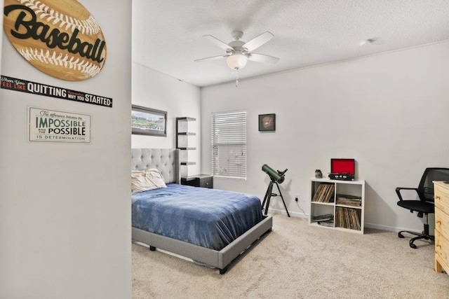 117 Mission Cove Cir, Saint Augustine, FL 32084 - bedroom with carpet flooring, a textured ceiling, baseboards, and a ceiling fan