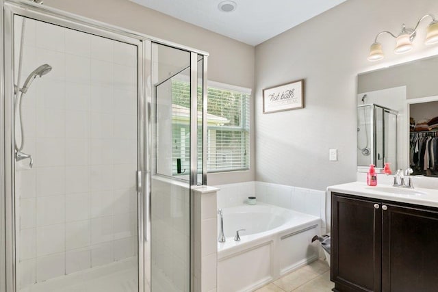 117 Mission Cove Cir, Saint Augustine, FL 32084 - full bathroom with a garden tub, a stall shower, vanity, and tile patterned floors