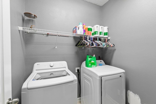117 Mission Cove Cir, Saint Augustine, FL 32084 - clothes washing area featuring washer and dryer