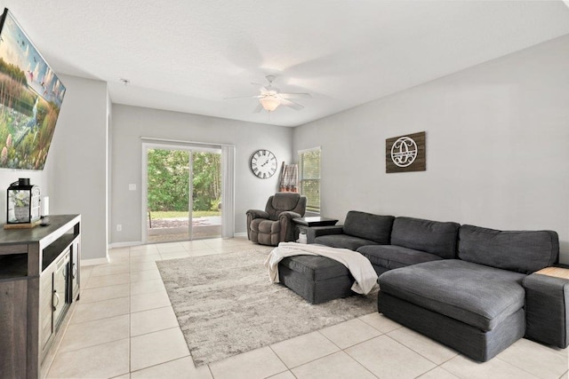 117 Mission Cove Cir, Saint Augustine, FL 32084 - living room featuring a ceiling fan, light tile patterned floors, and baseboards