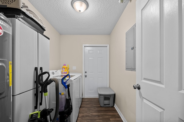 461 S Nassau St, Saint Augustine, FL 32084 - clothes washing area with washer and clothes dryer, dark wood-type flooring, electric panel, a textured ceiling, and baseboards