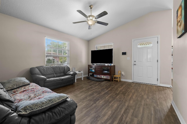 461 S Nassau St, Saint Augustine, FL 32084 - living area featuring vaulted ceiling, wood finished floors, a ceiling fan, and baseboards