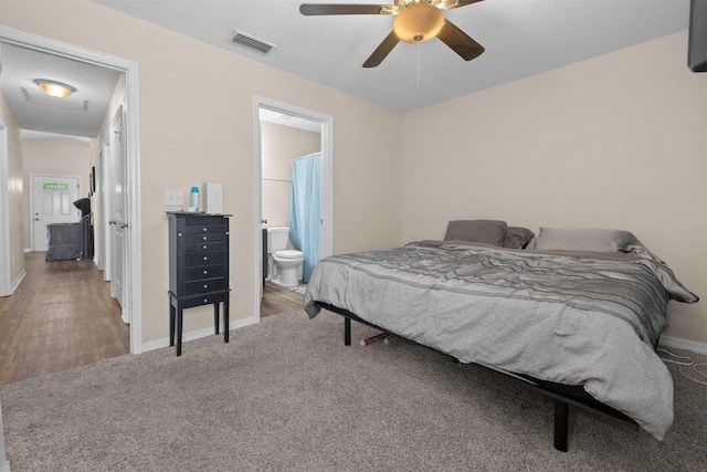 461 S Nassau St, Saint Augustine, FL 32084 - bedroom featuring baseboards, carpet floors, ensuite bath, and a ceiling fan
