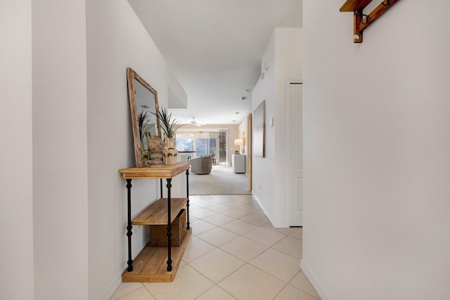 hallway with light tile patterned flooring