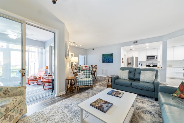 208 Augusta Cir, Saint Augustine, FL 32086 - living room featuring light wood finished floors and a ceiling fan