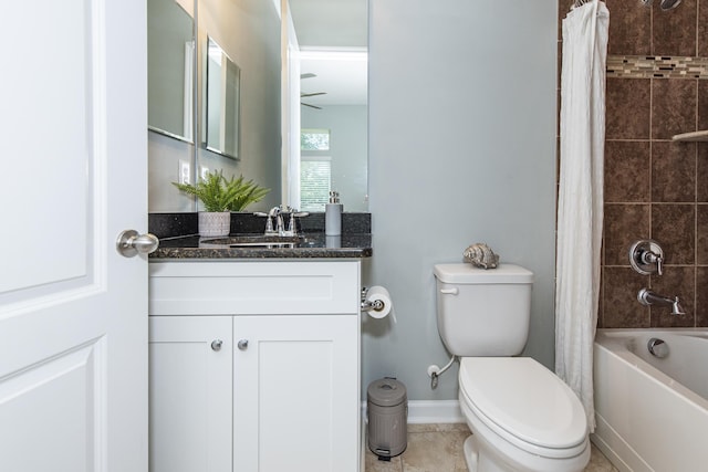 full bathroom with shower / bath combo, vanity, tile patterned floors, ceiling fan, and toilet