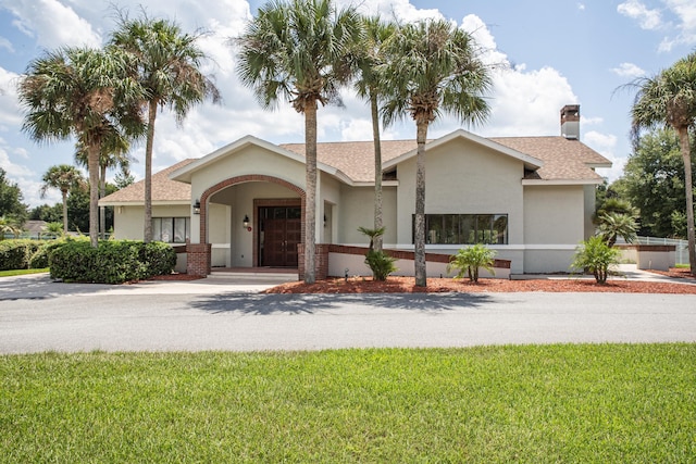 view of front of house with a front yard