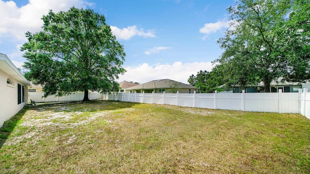 view of yard with fence