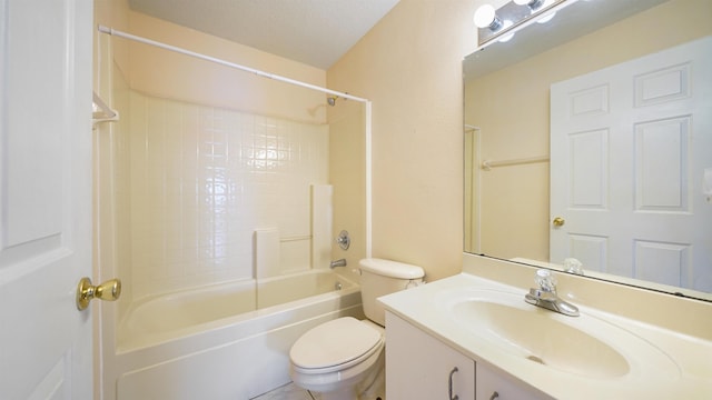 bathroom with toilet, bathtub / shower combination, and vanity