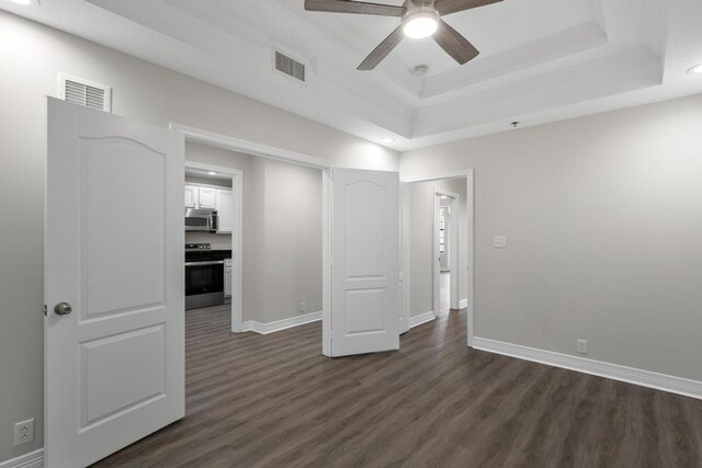 701 Market St Unit 304, Saint Augustine, FL 32095 - spare room featuring dark wood-type flooring, ceiling fan, baseboards, and recessed lighting