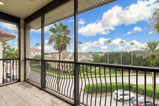 unfurnished sunroom with plenty of natural light