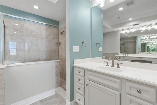 701 Market St Unit 304, Saint Augustine, FL 32095 - bathroom with a walk in shower, vanity, and recessed lighting