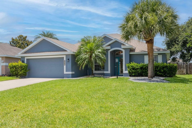 984 Windward Way, Saint Augustine, FL 32080 - ranch-style house with stucco siding, driveway, a garage, and a shingled roof