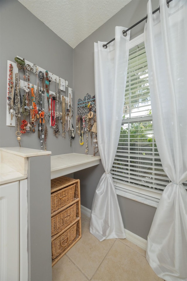 984 Windward Way, Saint Augustine, FL 32080 - bathroom with tile patterned flooring and a textured ceiling