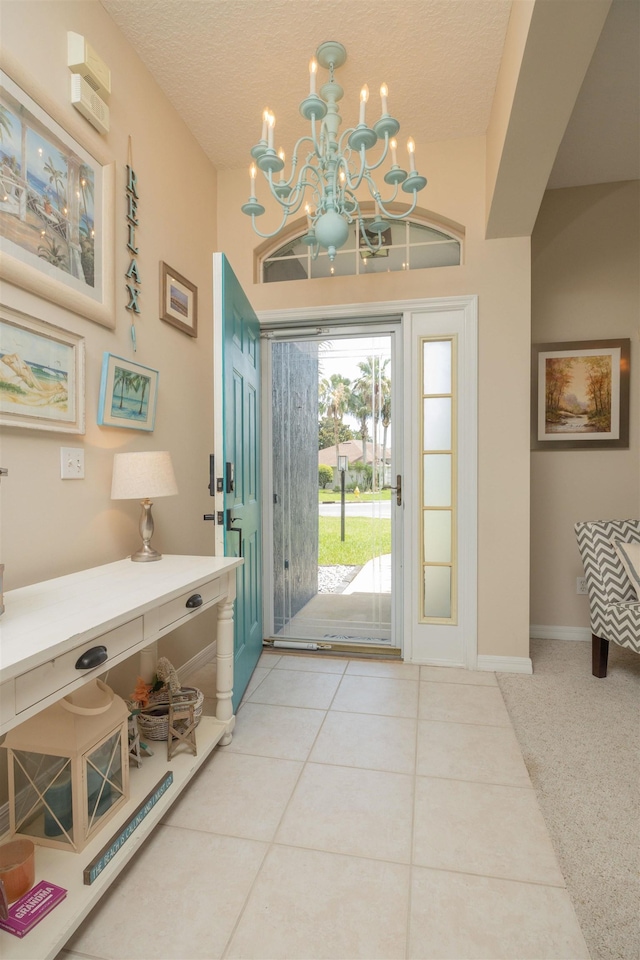 984 Windward Way, Saint Augustine, FL 32080 - entrance foyer featuring a chandelier and a textured ceiling