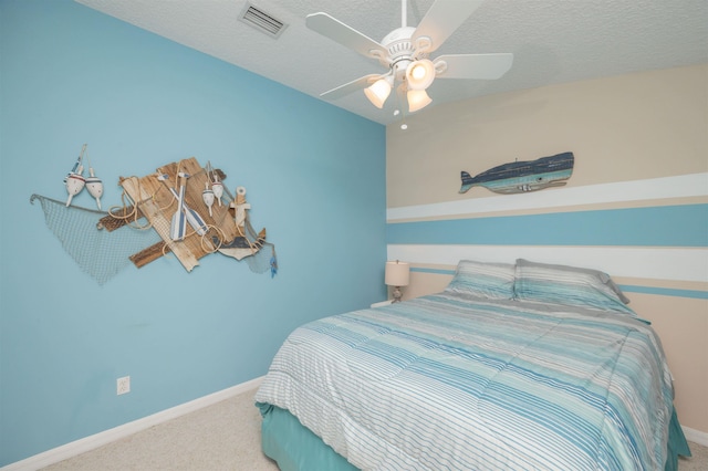 984 Windward Way, Saint Augustine, FL 32080 - carpeted bedroom with ceiling fan and a textured ceiling