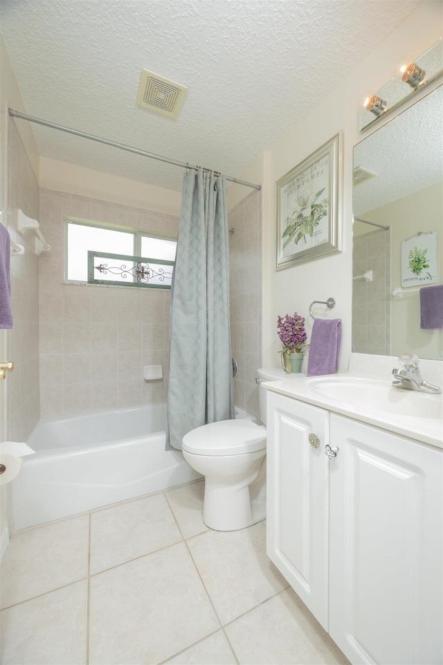 984 Windward Way, Saint Augustine, FL 32080 - bathroom with tile patterned floors, shower / bath combo, vanity, and a textured ceiling