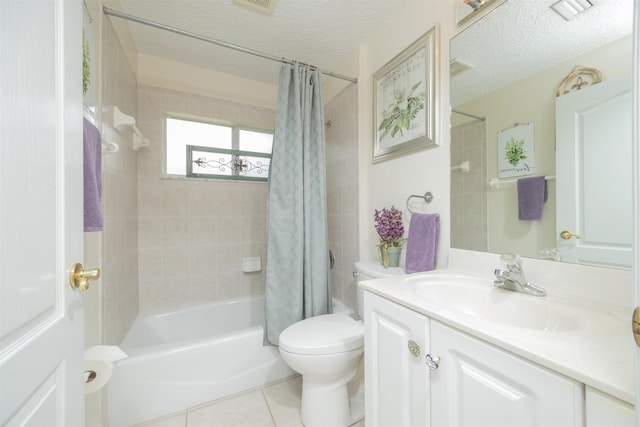 984 Windward Way, Saint Augustine, FL 32080 - bathroom with vanity, tile patterned floors, shower / bath combination with curtain, and a textured ceiling