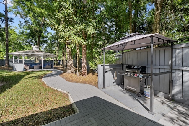 view of patio / terrace featuring a gazebo and area for grilling