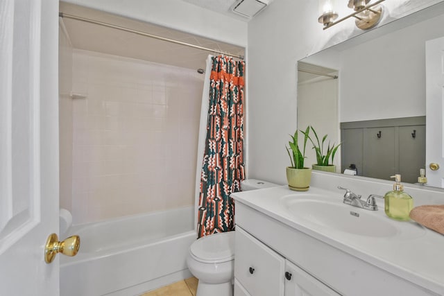 full bathroom featuring tile patterned flooring, toilet, vanity, visible vents, and shower / bath combo with shower curtain