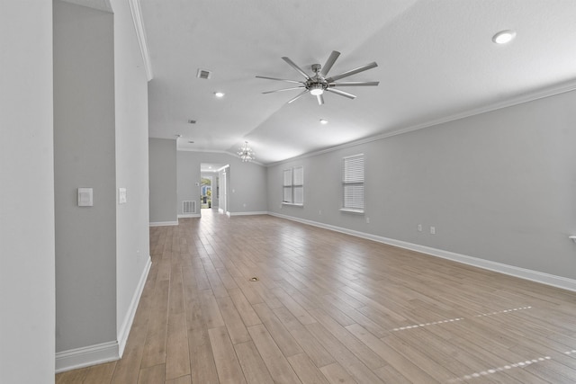 181 Narvarez Ave, Saint Augustine, FL 32084 - unfurnished living room with lofted ceiling, a ceiling fan, visible vents, and baseboards