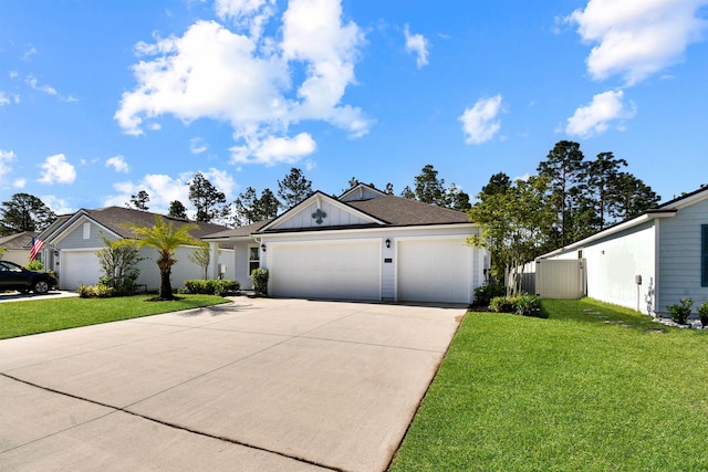 181 Narvarez Ave, Saint Augustine, FL 32084 - view of front of property with an attached garage, a front lawn, fence, and concrete driveway
