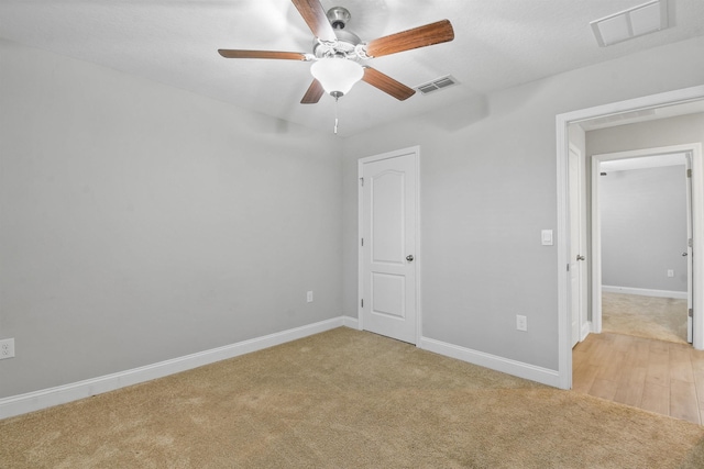 181 Narvarez Ave, Saint Augustine, FL 32084 - unfurnished bedroom with light carpet, a ceiling fan, visible vents, and baseboards