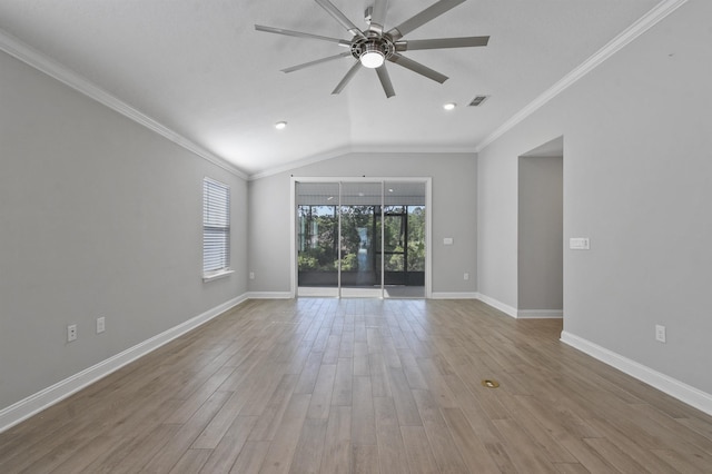 181 Narvarez Ave, Saint Augustine, FL 32084 - empty room with visible vents, lofted ceiling, wood finished floors, ceiling fan, and crown molding