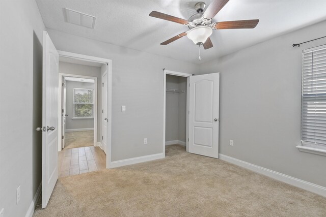 181 Narvarez Ave, Saint Augustine, FL 32084 - unfurnished bedroom featuring visible vents, a ceiling fan, carpet floors, a closet, and baseboards