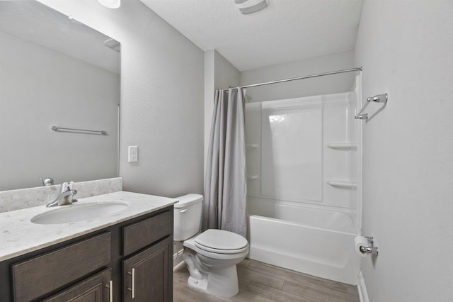 181 Narvarez Ave, Saint Augustine, FL 32084 - full bath with wood finished floors, vanity, baseboards, shower / tub combo, and toilet