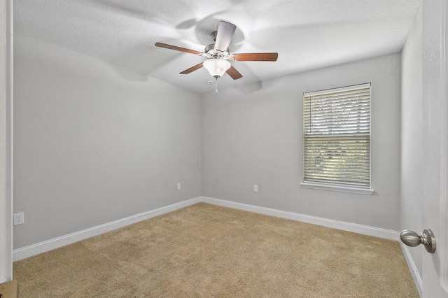 181 Narvarez Ave, Saint Augustine, FL 32084 - spare room featuring baseboards, light colored carpet, and ceiling fan