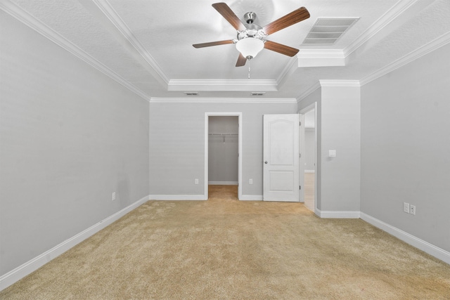 181 Narvarez Ave, Saint Augustine, FL 32084 - unfurnished bedroom with light carpet, a tray ceiling, visible vents, baseboards, and crown molding