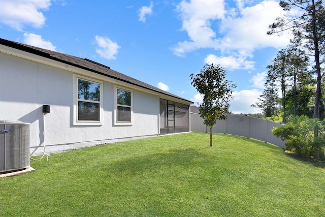 181 Narvarez Ave, Saint Augustine, FL 32084 - view of yard with cooling unit, a sunroom, and fence