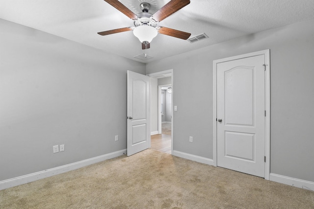 181 Narvarez Ave, Saint Augustine, FL 32084 - unfurnished bedroom with ceiling fan, carpet floors, visible vents, and baseboards