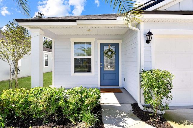 181 Narvarez Ave, Saint Augustine, FL 32084 - view of exterior entry with a garage and covered porch