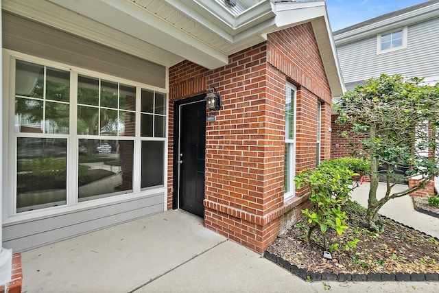 doorway to property featuring a porch