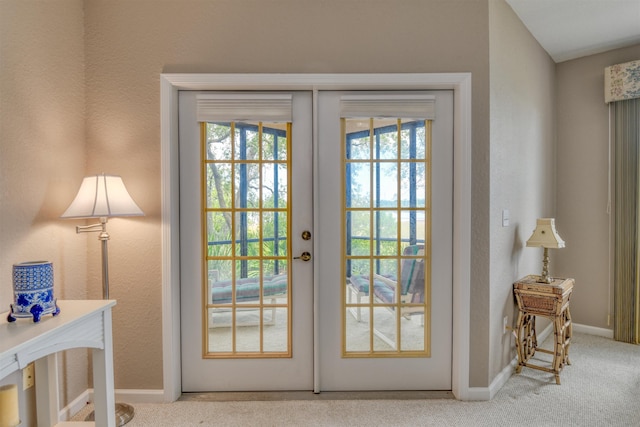2202 Vista Cove Rd, Saint Augustine, FL 32084 - doorway to outside featuring carpet floors, plenty of natural light, baseboards, and french doors